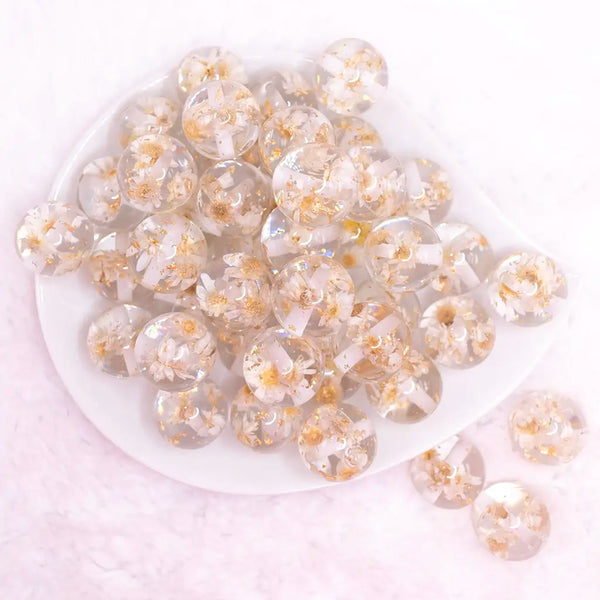 top view of a pile of 20mm White Flaked Flower Bubblegum Bead