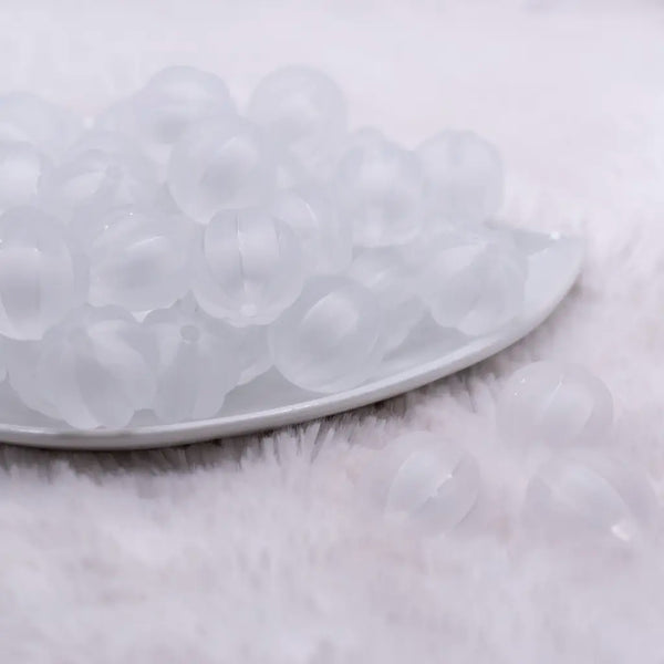 front view of a pile of 20mm White Frosted Pumpkin Shaped Bubblegum Bead