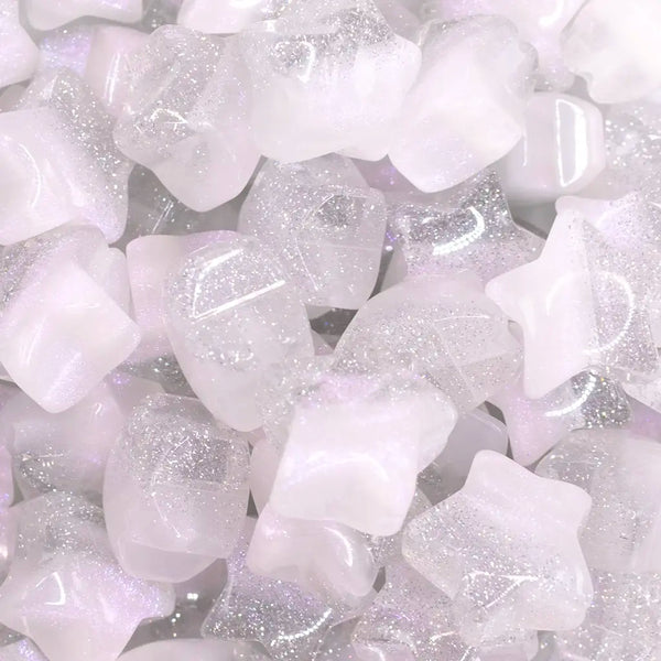 close up view of a pile of 20mm White Opal Star Shaped Acrylic Beads