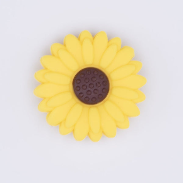 top view of a yellow 20mm Silicone Daisy Focal Beads