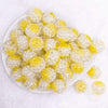 top view of a pile of 20mm Yellow Captured Pearls Bubblegum Bead