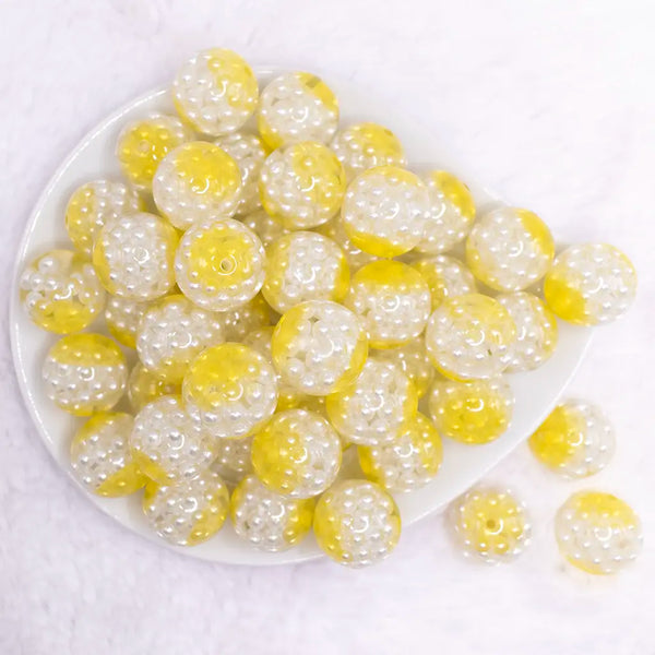 top view of a pile of 20mm Yellow Captured Pearls Bubblegum Bead