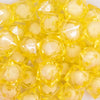 close up view of a pile of 20mm Yellow Transparent Cube with Middle Bubblegum Beads