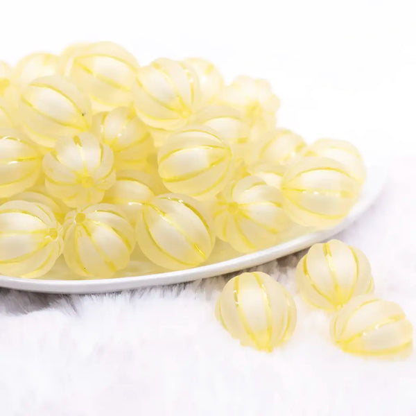 front view of a pile of 20mm Yellow Frosted Pumpkin Shaped Bubblegum Bead