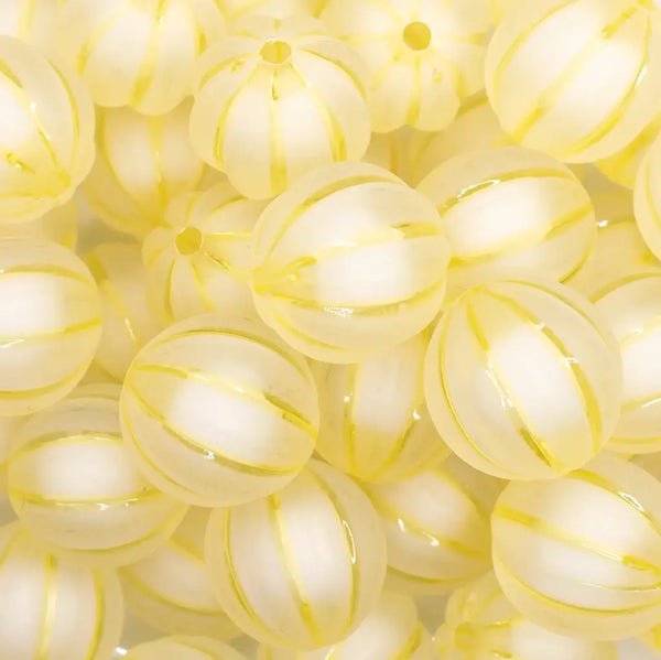 close up view of a pile of 20mm Yellow Frosted Pumpkin Shaped Bubblegum Bead