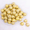 top view of a pile of 20mm Yellow Lace AB Bubblegum Beads