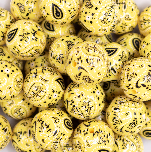 close up view of a pile of 20mm Yellow Paisley Acrylic Bubblegum Beads