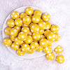 top view of a pile of 20mm Yellow with White Polka Dots Bubblegum Beads