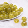 front view of a pile of 20mm Yellow Glitter Tinsel Bubblegum Beads