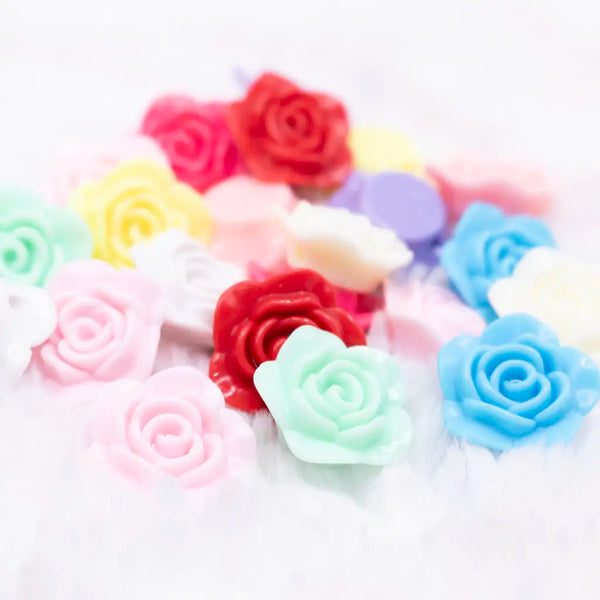Assorted view of a pile of 20mm Acrylic Rose Focal Beads