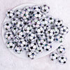 top view of a pile of 20mm Soccer print with AB Finish Bubblegum Beads