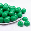front view of pile of 20mm kelly green solid bubblegum bead 