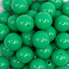 close up view of pile of 20mm kelly green solid bubblegum bead 