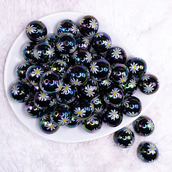 top view of a pile of 20mm White Daisy AB on Black Bubblegum Beads
