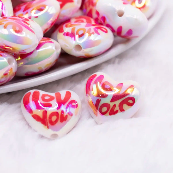 close up view of a pile of 22mm I Love You Heart Shaped Acrylic Beads