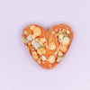 macro view of a pile of 23mm Orange Watercolor Heart Acrylic Bead
