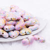 front view of a pile of 23mm Pink Watercolor Heart Acrylic Bead