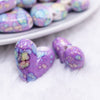 close up view of a pile of 23mm Purple Watercolor Heart Acrylic Bead