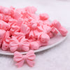 front view of a pile of 25mm Quartz Pink Bow Knot silicone bead