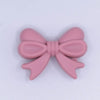 top view of a pile of 25mm Rose Pink Bow Knot silicone bead