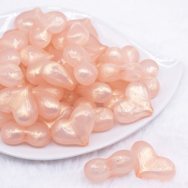 front view of a pile of 28mm Champagne Pearl Heart Acrylic Bubblegum Beads