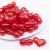 front view of a pile of 28mm Red Glitter Pearl Heart Acrylic Bubblegum Beads