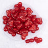 top view of a pile of 28mm Red Glitter Pearl Heart Acrylic Bubblegum Beads