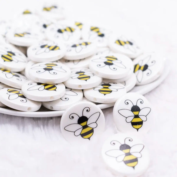 front view of a pile of 25mm Bumble Bee Print Flat Disc Acrylic Bubblegum Beads - 10 Count