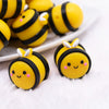 close up view of a pile of 3D BumbleBee silicone focal bead