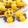 close up view of a pile of 3D Bee silicone focal bead