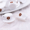 macro view of a pile of 3D Coffee Cup Silicone Focal Bead Accessory