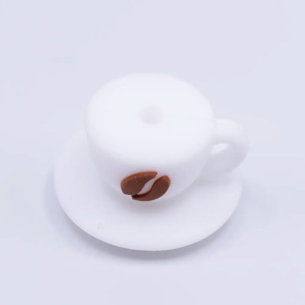 top view of a pile of 3D Coffee Cup Silicone Focal Bead Accessory