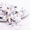 front view of a pile of 3D Cow silicone focal bead