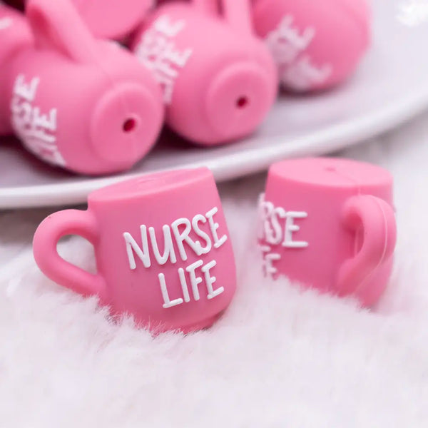 macro view of a pile of 3D Nurse Life Coffee Cup Silicone Focal Bead Accessory