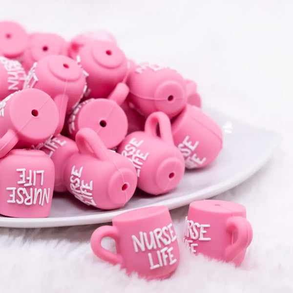 front view of a pile of 3D Nurse Life Coffee Cup Silicone Focal Bead Accessory