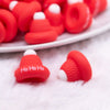 close up view of a pile of 3D Red Santa Hat silicone focal bead