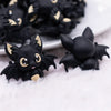 front view of a pile of 3D Black Bat silicone focal bead