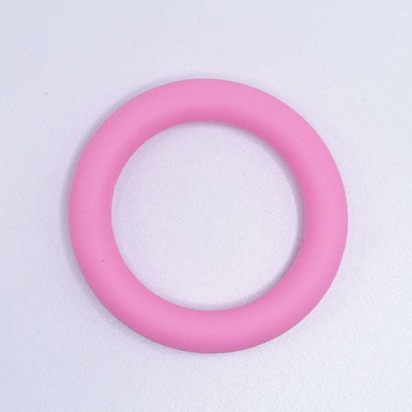 view of a pink of 65mm Round Ring Silicone Focal Beads Accessory