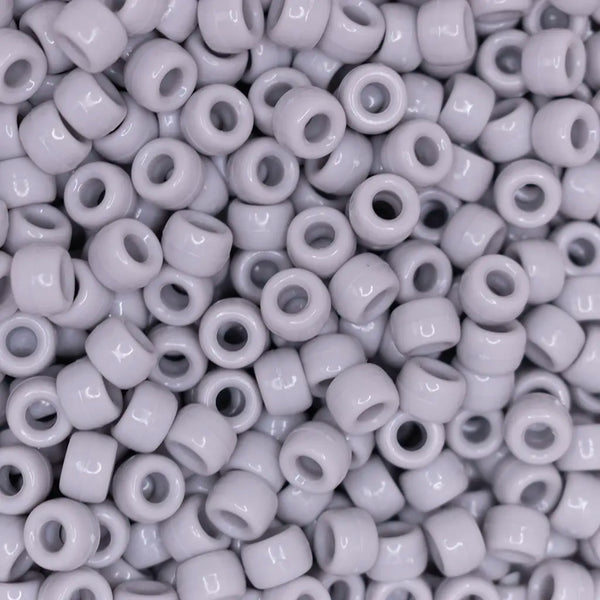 top view of a pile of grey 6mm x 9mm Acrylic Pony Beads