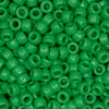 top view of a pile of green 6mm x 9mm Acrylic Pony Beads