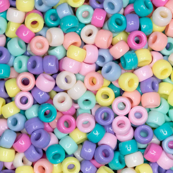 top view of a pile of mixed pastel 6mm x 9mm Acrylic Pony Beads