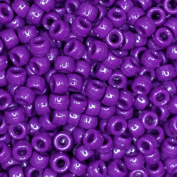 top view of a pile of purple 6mm x 9mm Acrylic Pony Beads