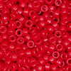 top view of a pile of red 6mm x 9mm Acrylic Pony Beads