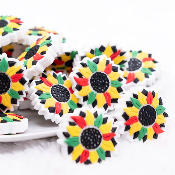 front view of a pile of African Inspired Daisy Silicone Focal Bead Accessory