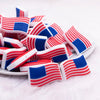 close up view of a pile of American Flag Silicone Focal Bead Accessory
