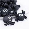 close up view of a pile of Spider Silicone Focal Bead Accessory