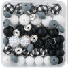 front view of a pile of Black and White Silicone Variety Bead Pack - 64 Pieces