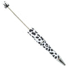 top view of a black and white  cow print DIY Plastic Beadable Pens - The Printed Collection