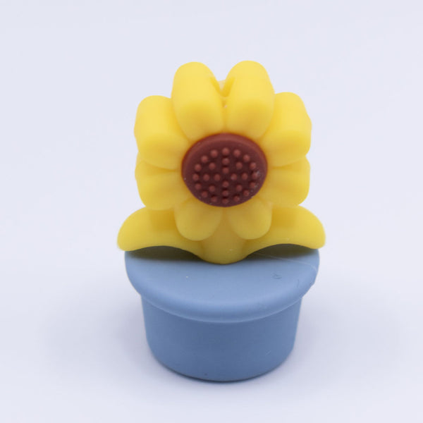 front view of a blue Sunflower Pot Silicone Focal Beads Accessory