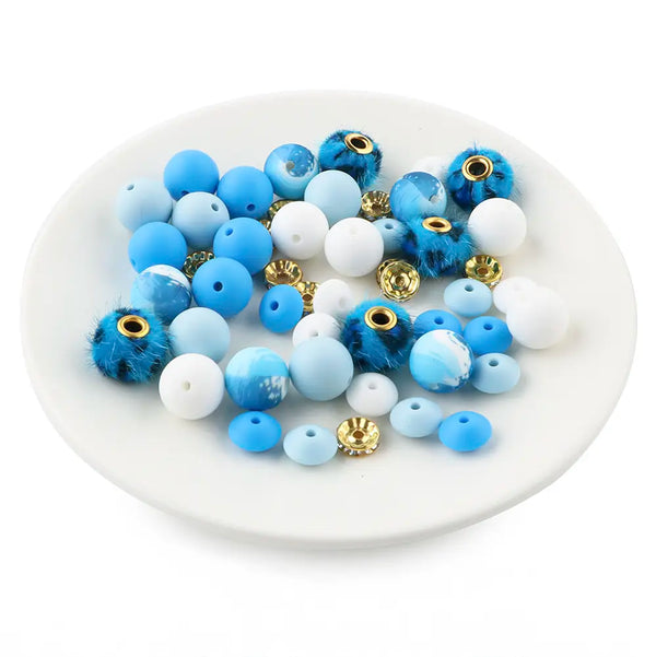 front view of a pile of Blue Animal Print Silicone Variety Bead Pack - 50 Pieces